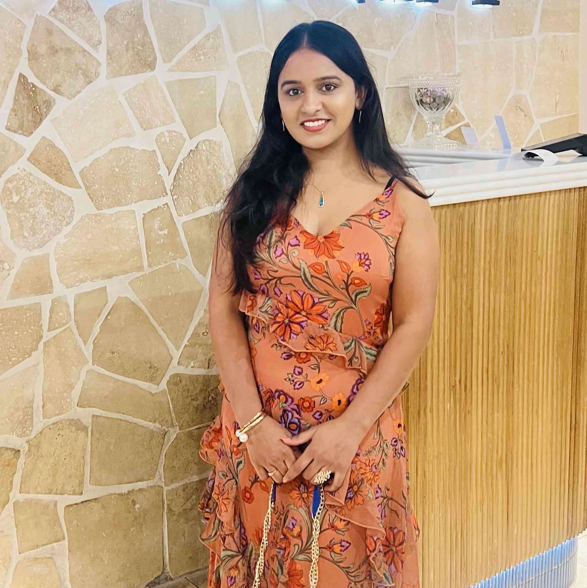 Naveena P.